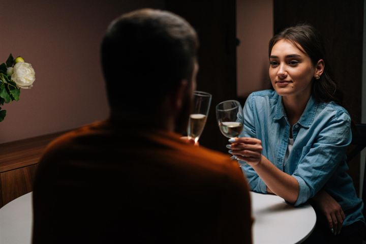 Woman meeting a potential date in a public restaurant